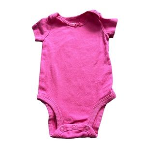 Pink Carter’s Onesie with a Bow
